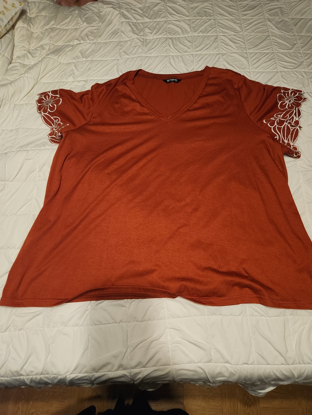 BloomChic V-Neck Tee with White Floral Sleeve Embroidery